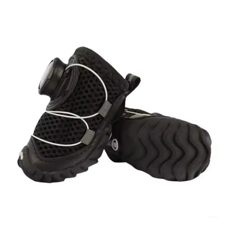 Black breathable mesh dog boots for French Bulldogs with quick-adjust closure and anti-slip rubber sole. Lightweight outdoor paw protectors for summer walks and hikes.