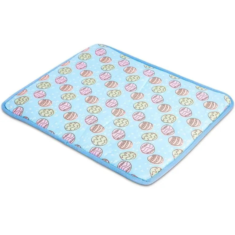 Blue cooling pad for French Bulldogs with colorful egg print, soft and breathable summer pet mat for hot weather.