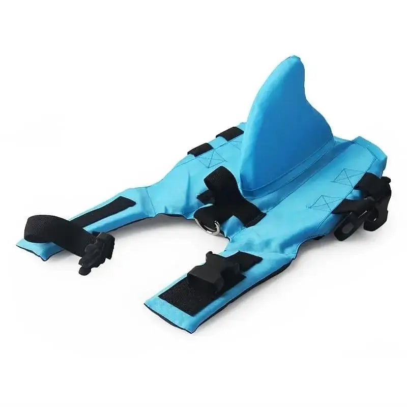 Flat lay isolated shot of blue shark fin adjustable dog life jacket vest with black buckle straps
