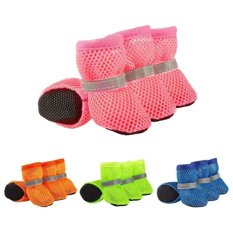 Breathable mesh dog boots for French Bulldogs, available in pink, orange, neon green, and blue. Adjustable anti-slip summer paw protectors with reflective straps, ideal for hot pavement walks.
