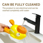 Duck-shaped dog treat dispenser toy being washed with water, fully cleanable non-electrical interactive toy for French Bulldogs