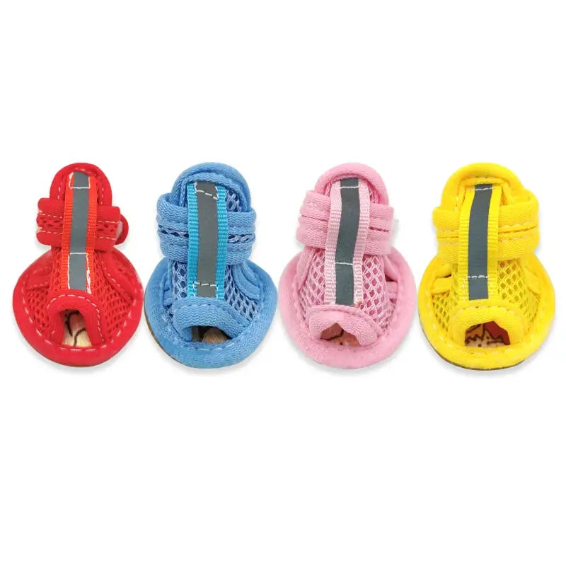 Front view of dog sandals for French Bulldogs in red, blue, pink, and yellow, highlighting breathable mesh and reflective strap details.