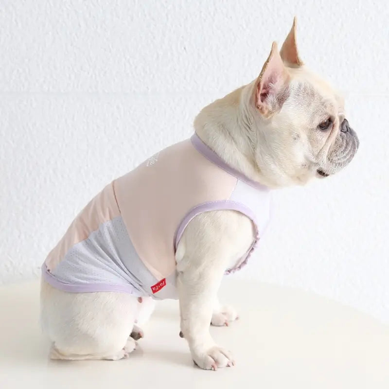 French Bulldog wearing pink lavender breathable mesh cooling tank vest, lightweight summer dog sleeveless shirt for hot weather