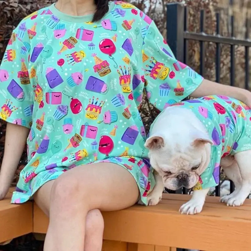 Matching birthday print t-shirt set for French Bulldog and owner, outdoor lifestyle photo