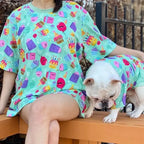 Matching birthday print t-shirt set for French Bulldog and owner, outdoor lifestyle photo