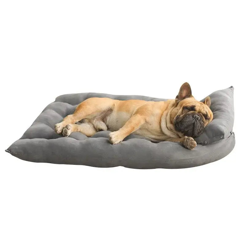 French Bulldog sleeping comfortably on a gray convertible plush dog bed, showing the soft and supportive cushion design.