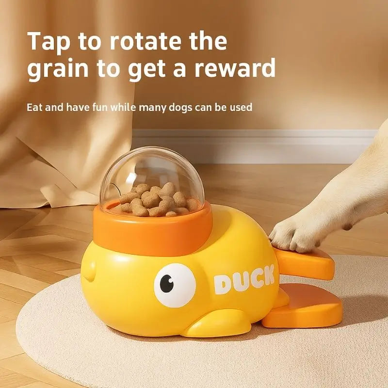 Interactive duck-shaped dog treat dispenser toy - press the foot pedal to release kibble, fun feeding enrichment for French Bulldogs
