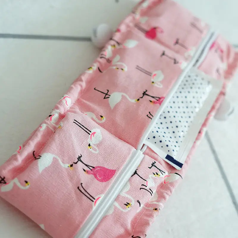 Close up of pink flamingo printed dog cooling neck wrap zipper pocket with ice insert, refillable chill band for French Bulldogs hot weather | Frenchie Nest