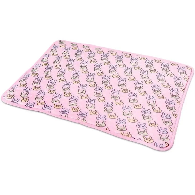 Pink cooling pad for French Bulldogs with cute rabbit print, lightweight and breathable summer pet mat.
