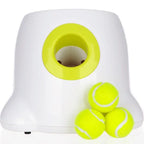 Compact automatic dog tennis ball launcher with 3 mini tennis balls for small breeds like French bulldogs
