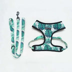 Tropical monstera leaf print dog harness and matching leash set for French Bulldogs, complete walking kit with adjustable straps.